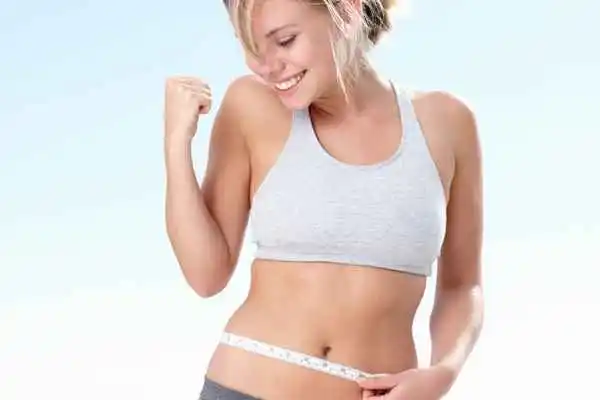 woman happy after fat reduction treatment Stockport