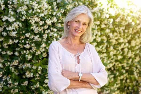 Older woman happy with urinary incontinence treatment Stockport